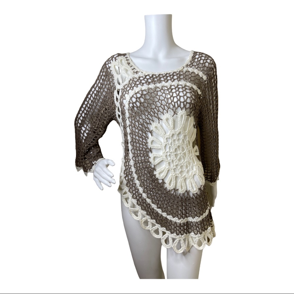 1.2.3. Asymmetrical crochet top with bell sleeves